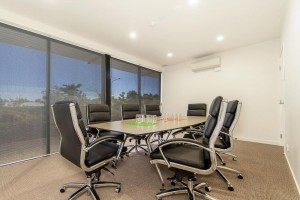 Executive style chairs around a boardroom table